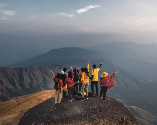 hiking-travellers-group-colorful-shirts-standing-middle-golden-meadow-mountain-biew-pointing-your-finger-their-own-destination-mulayit-taung-myanmar